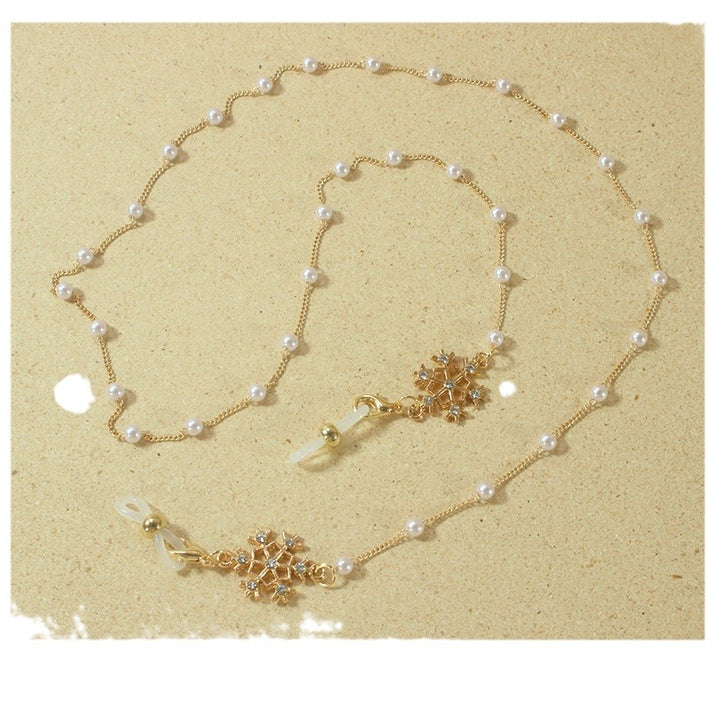 Elegant glasses holder chain with pearls and snowflake pendant Bowlift