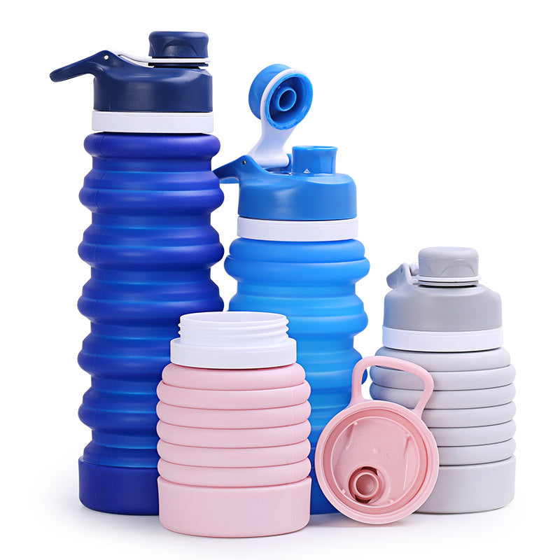 Collapsible silicone water bottle with ergonomic ribbed grip and flip-top spout Bowlift