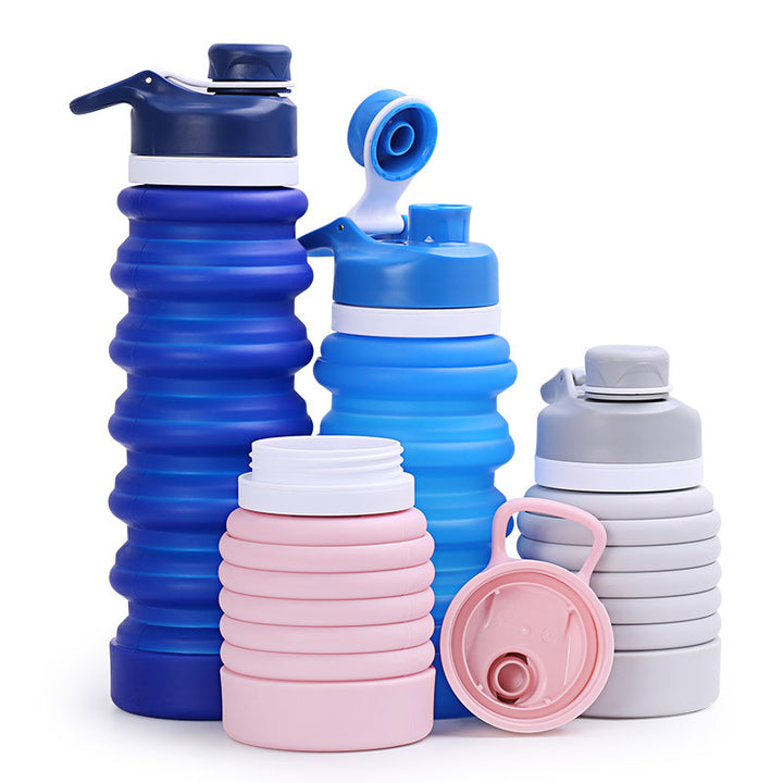 Collapsible silicone water bottle with ergonomic ribbed grip and flip-top spout Bowlift
