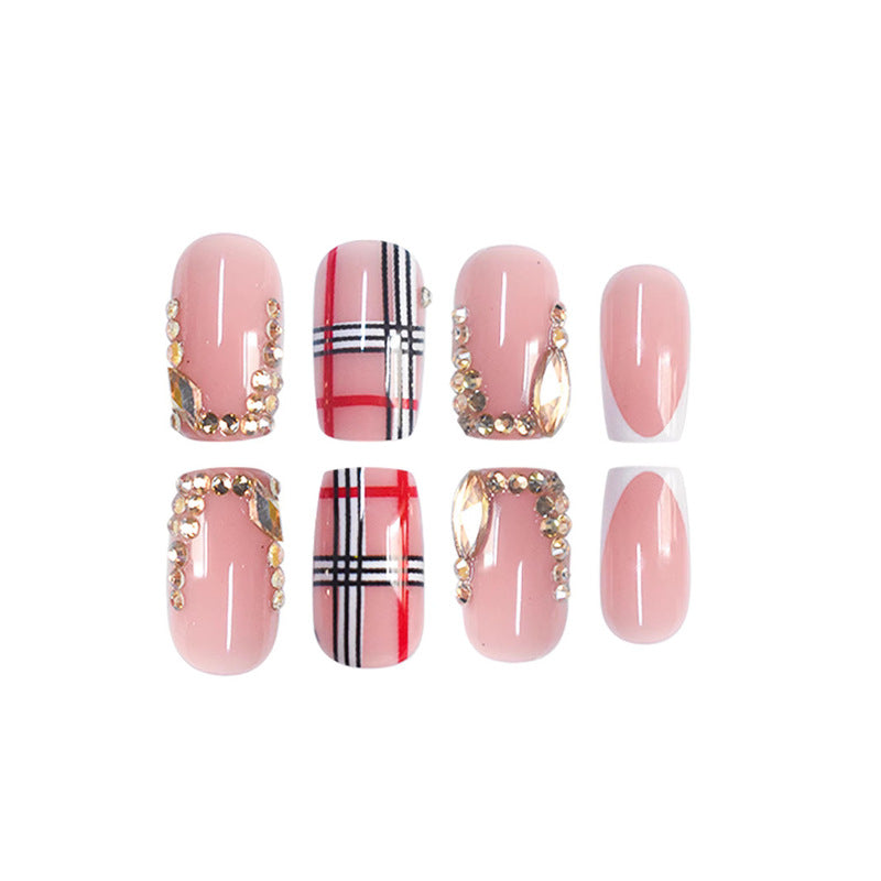 Decorative Press-On Nail Art with Gold Accents Bowlift