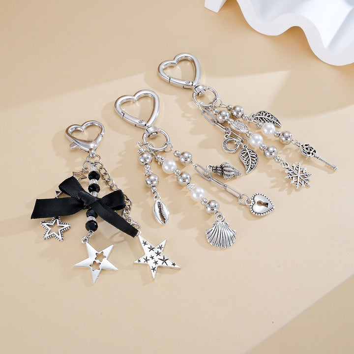 Keychain with Sparkling Stars and Bow Design Bowlift