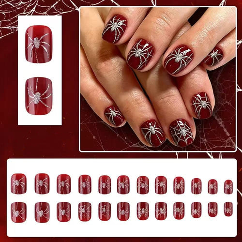 Acrylic nail set with spooky spider and glitter accents Bowlift