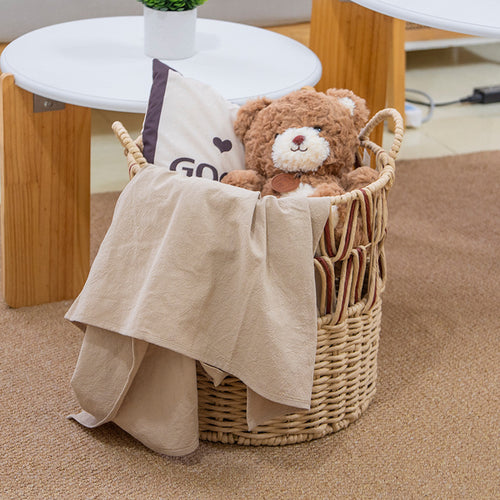 Braided storage basket with elegant accents