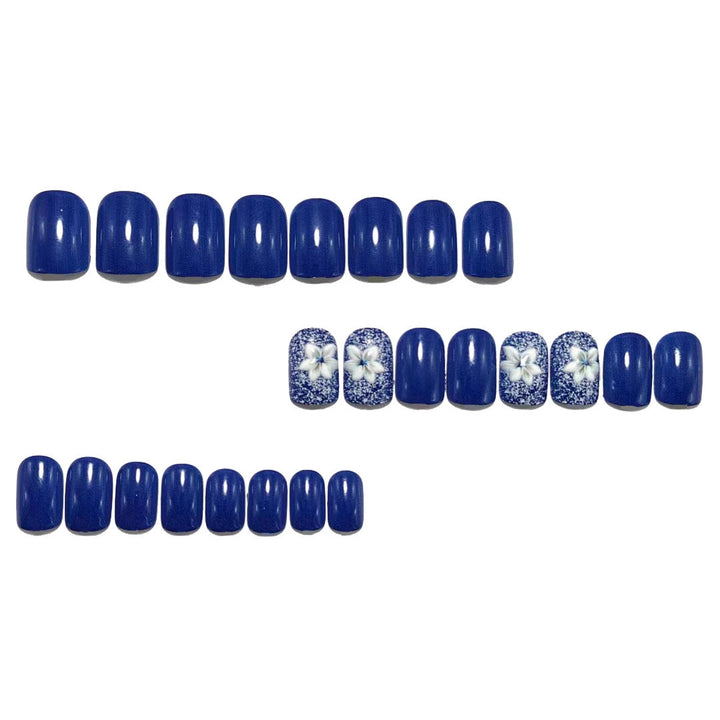 Artificial nails in elegant glitter design with floral embellishments Bowlift