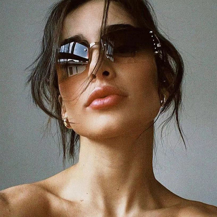Ladies extravagant sunglasses in modern design with fine accents Bowlift