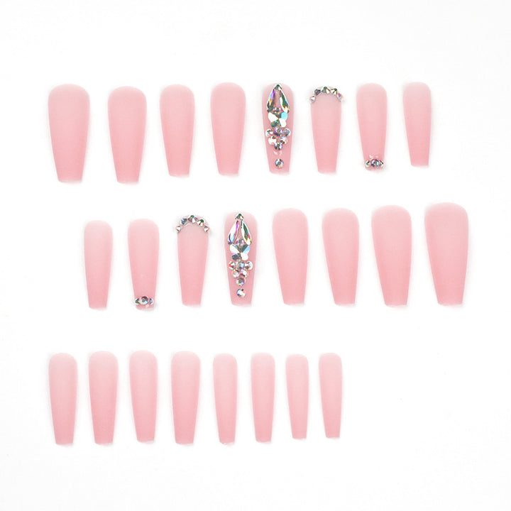 Artistic acrylic nails with glitter and rhinestone embellishments Bowlift