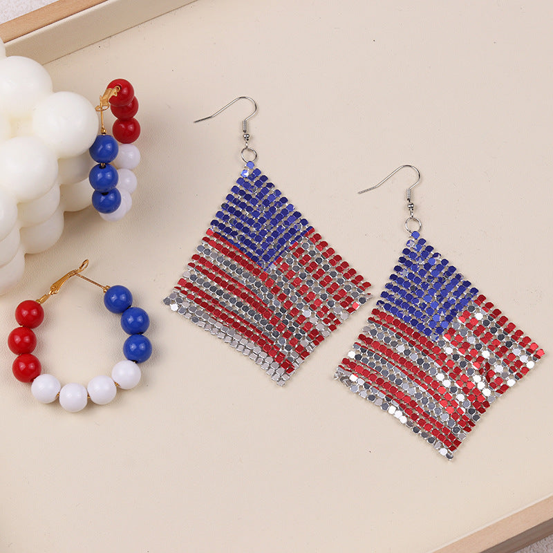 Ladies nan pearl earrings with stacked sphere beads and gold-colored snap clasp Bowlift