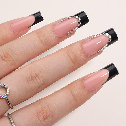 Artificial nail set with elegant tips and glitter accents Bowlift
