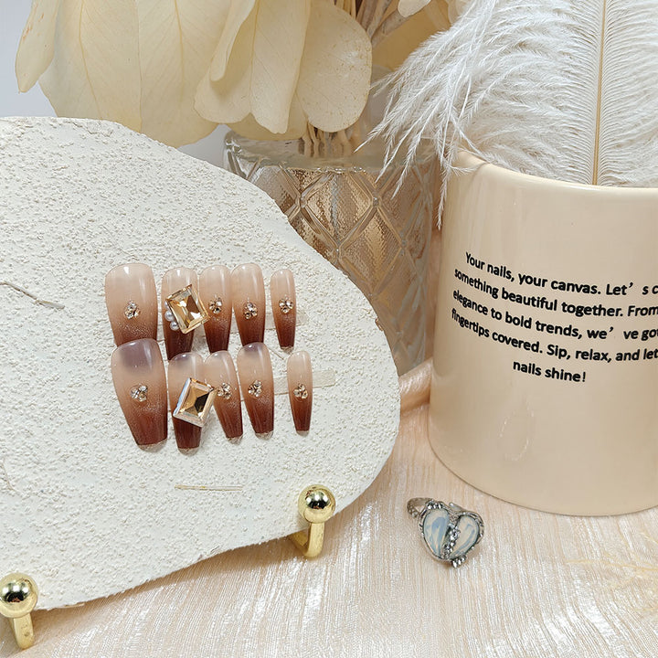 Artificial nails with elegant ombre effect and exquisite gemstones Bowlift