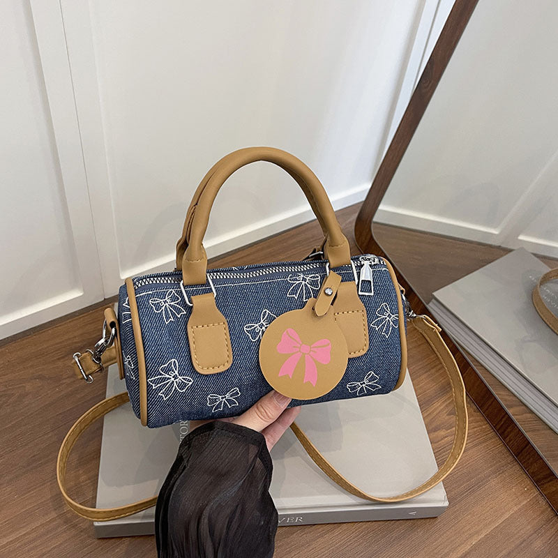 WoPlayful Bow-Printed Mini Handbag Bowlift