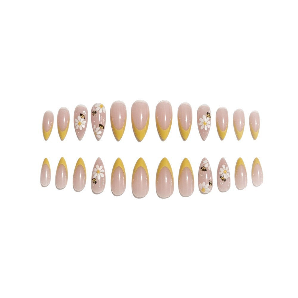 Artificial nails with elegant French tip and floral accents Bowlift