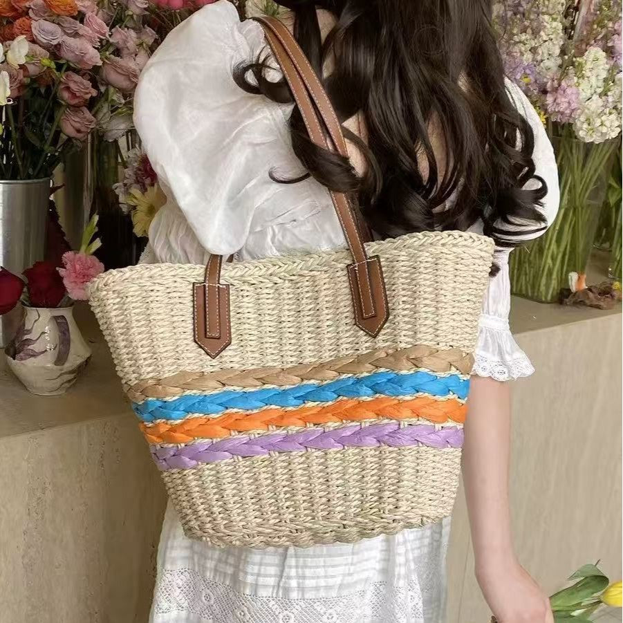 Shoulder bag made of braided material with colorful detail Bowlift
