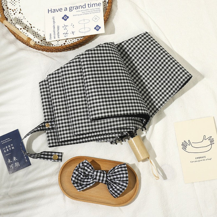 Ladies elegant folding umbrella with classic check pattern Bowlift