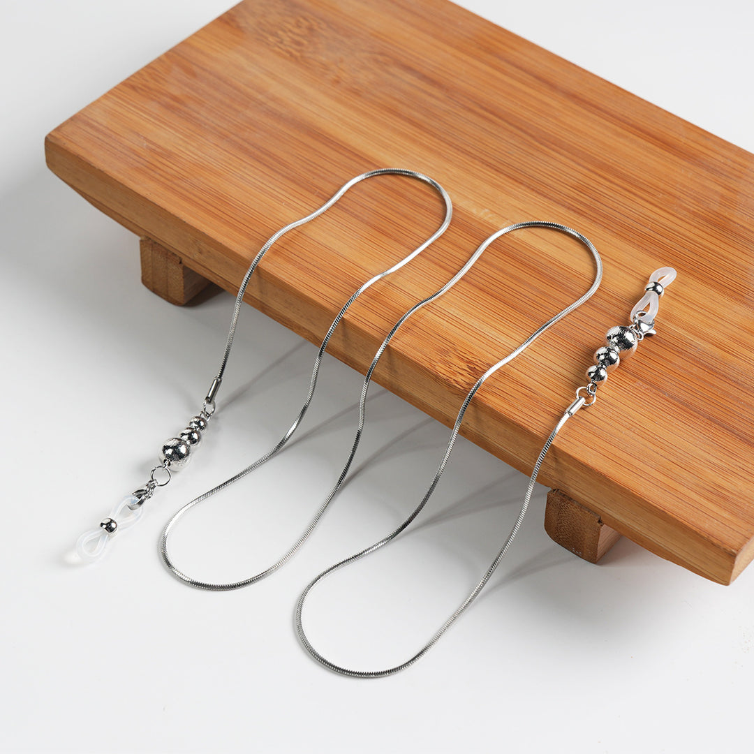 Sleek Metallic Eyewear Chain Bowlift