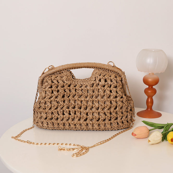 Handcrafted rattan bag with elegant handles and chain straps Bowlift