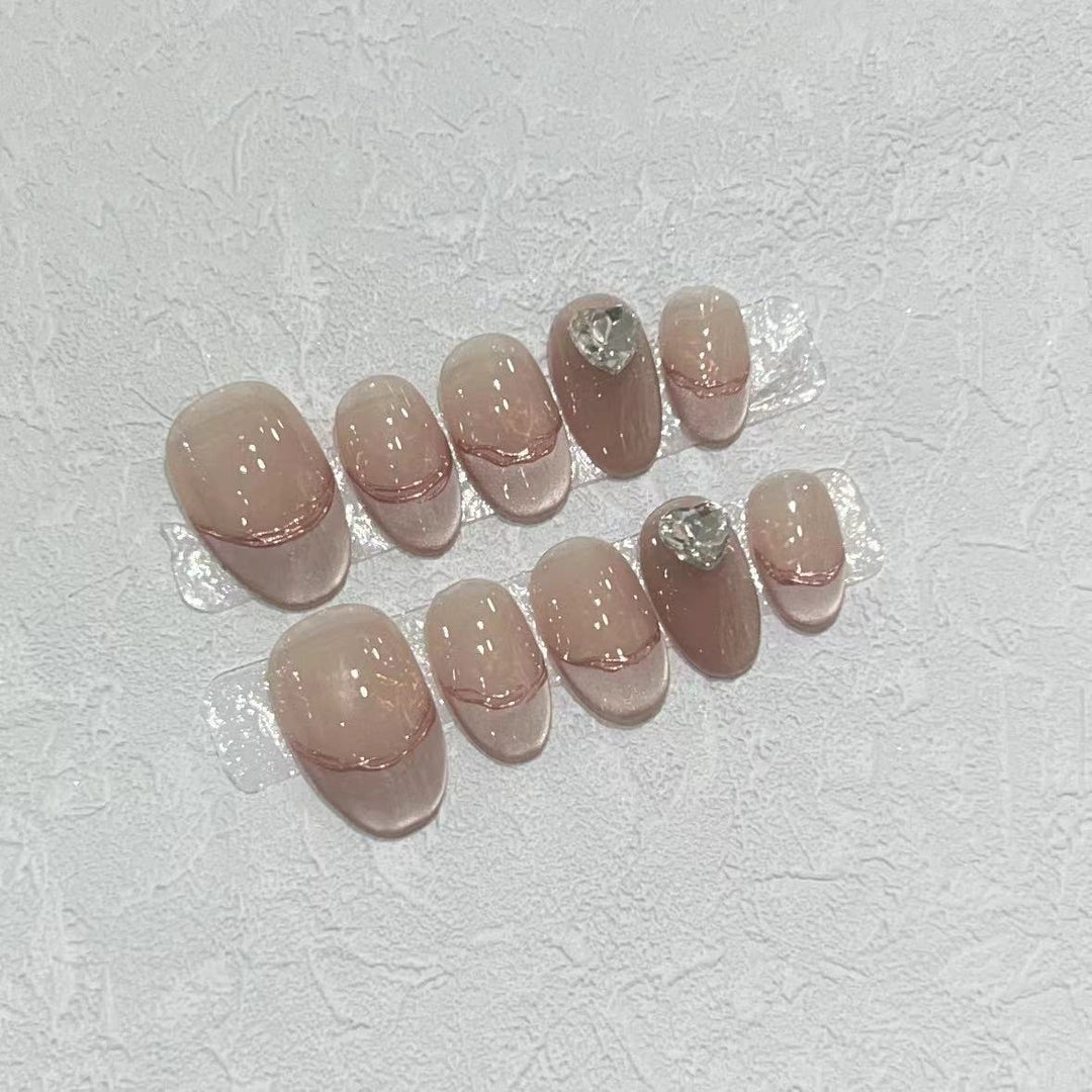 Elegant Press-On Nail Set with Jewel Accents Bowlift