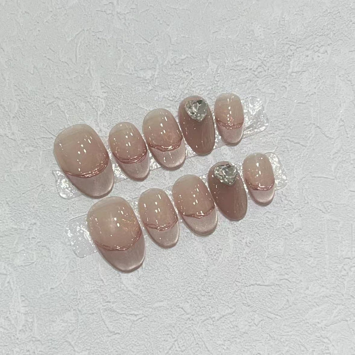 Elegant Press-On Nail Set with Jewel Accents Bowlift