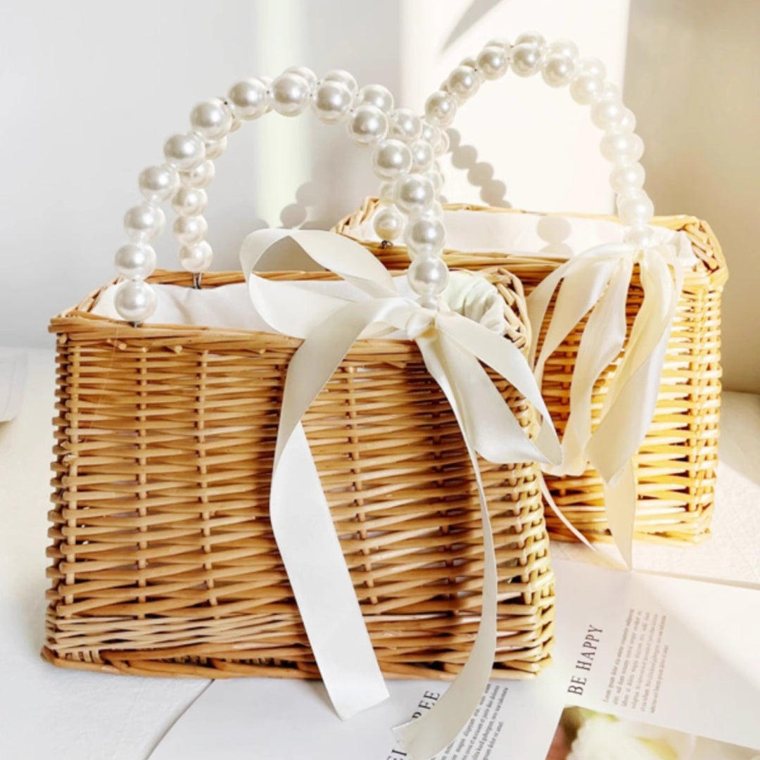 Ladies handbag made of braided material with elegant pearl handles Bowlift