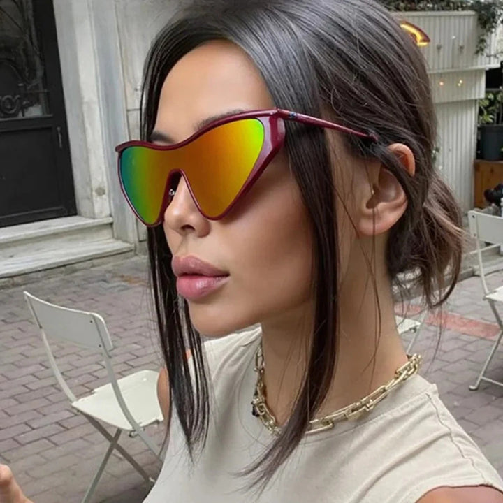Ladies extravagant shaped sunglasses with protective UV filter Bowlift