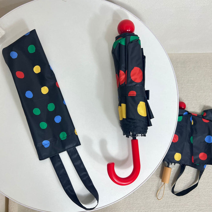 Ladies designer foldable umbrella with colorful polka dot pattern Bowlift