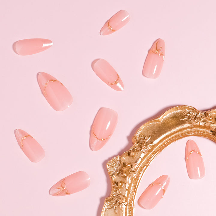 Artistic Pointed Press-On Nails with Gold Accents Bowlift