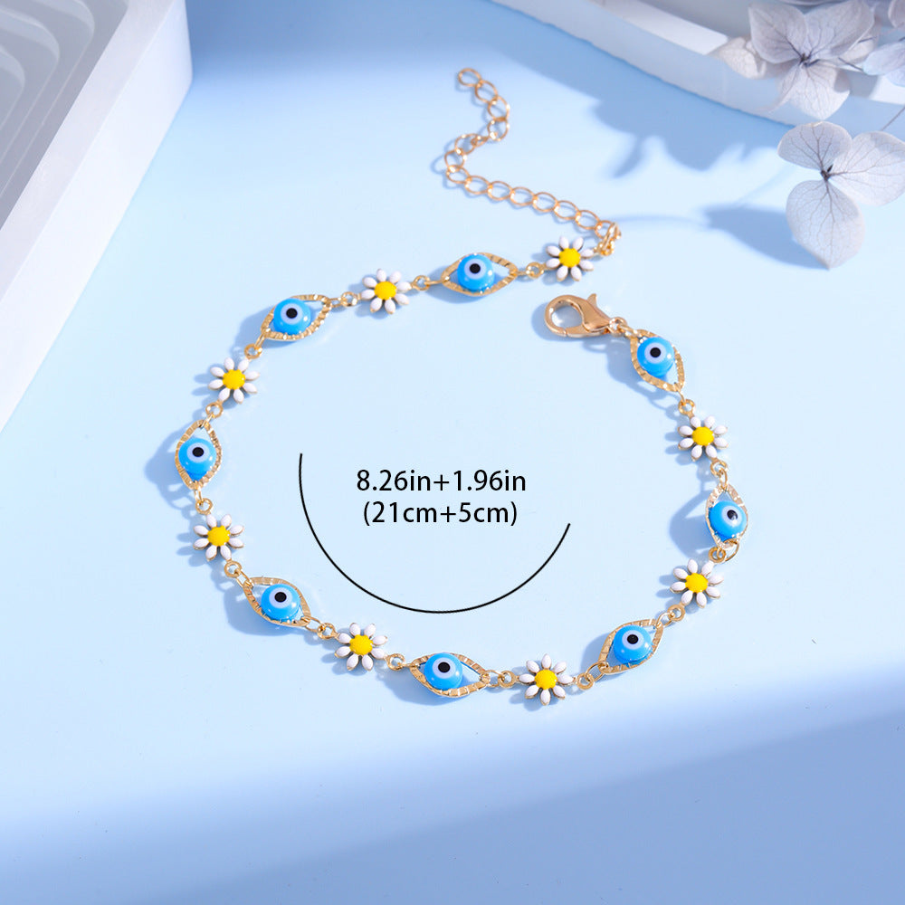 Eye Charm and Daisy Bracelet Bowlift