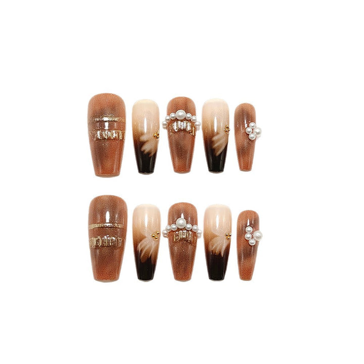 Artificial nails with elegant pearl and gold accents Bowlift