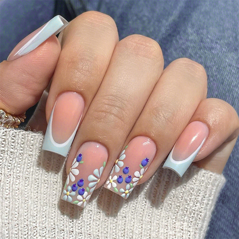 Creative nail art set with floral and shiny accents Bowlift