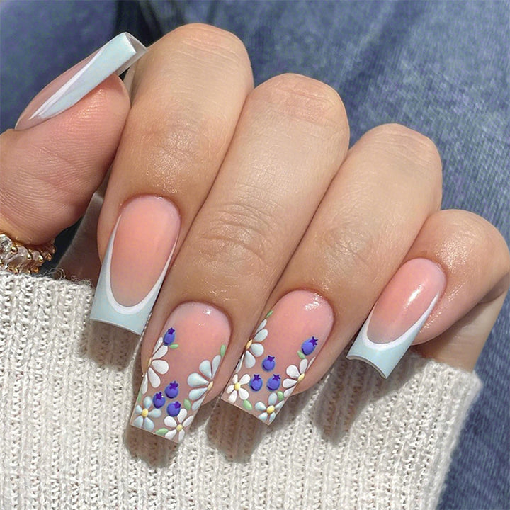Creative nail art set with floral and shiny accents Bowlift