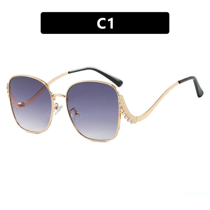 Women's striking sunglasses with sparkling appliqués Bowlift