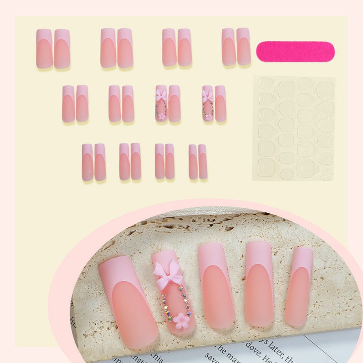Decorative Press-On Nail Art with Floral and Bow Accents Bowlift