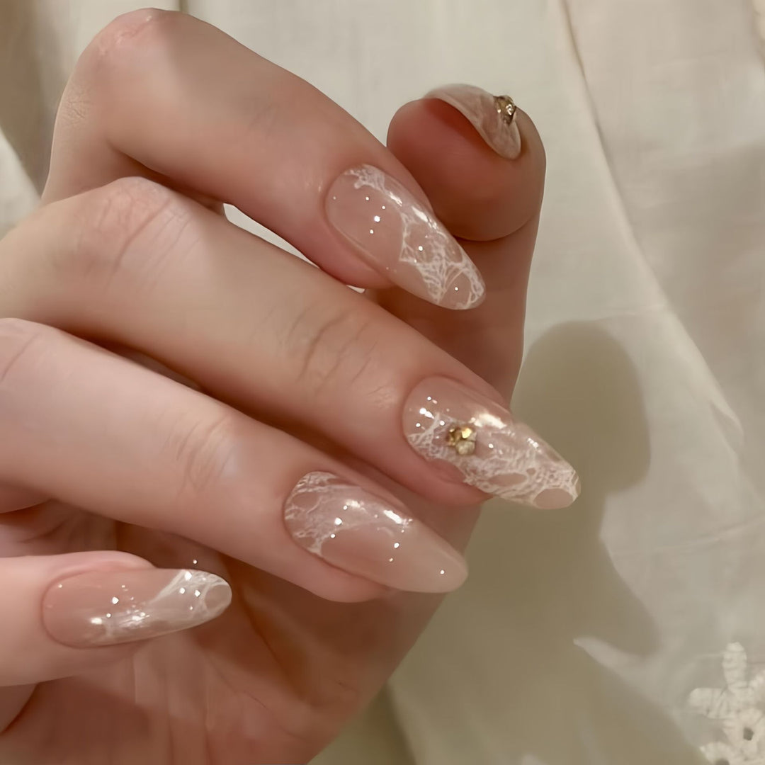 Elegant artificial nails with tips and glitter Bowlift