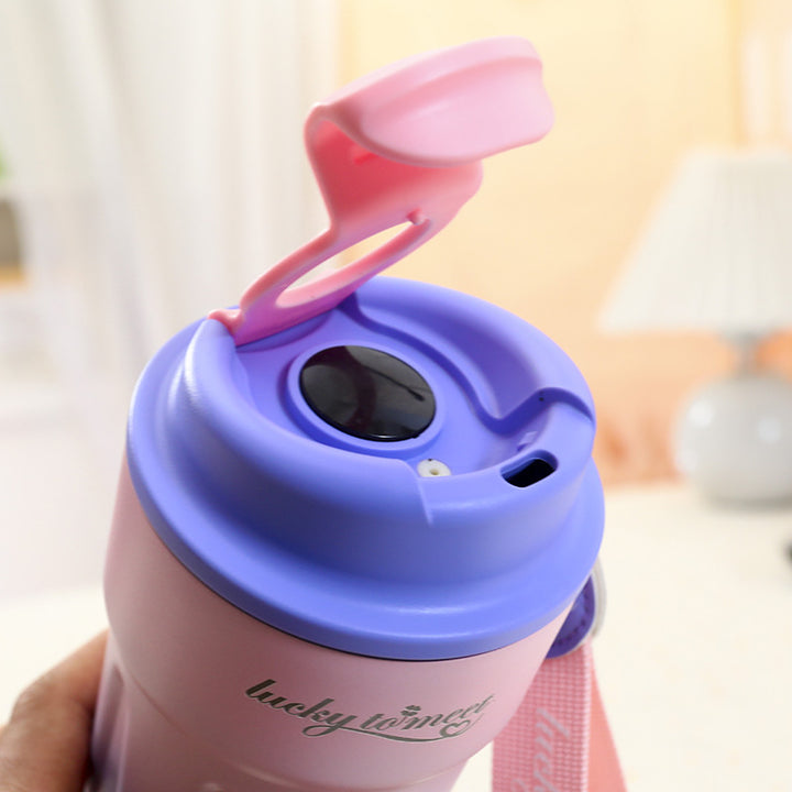 Women’s insulated cup with innovative drip protection and practical carrying handle Bowlift