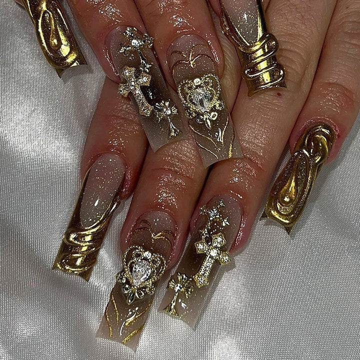 Glamorous artificial nail set with sparkling rhinestones and cross decorations Bowlift