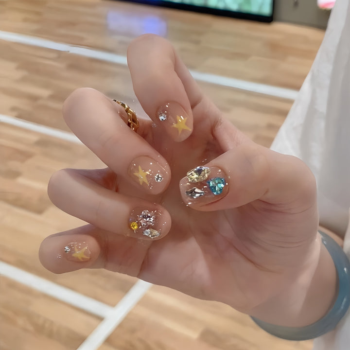 Glittering nail tips with elegant jewelry accents Bowlift