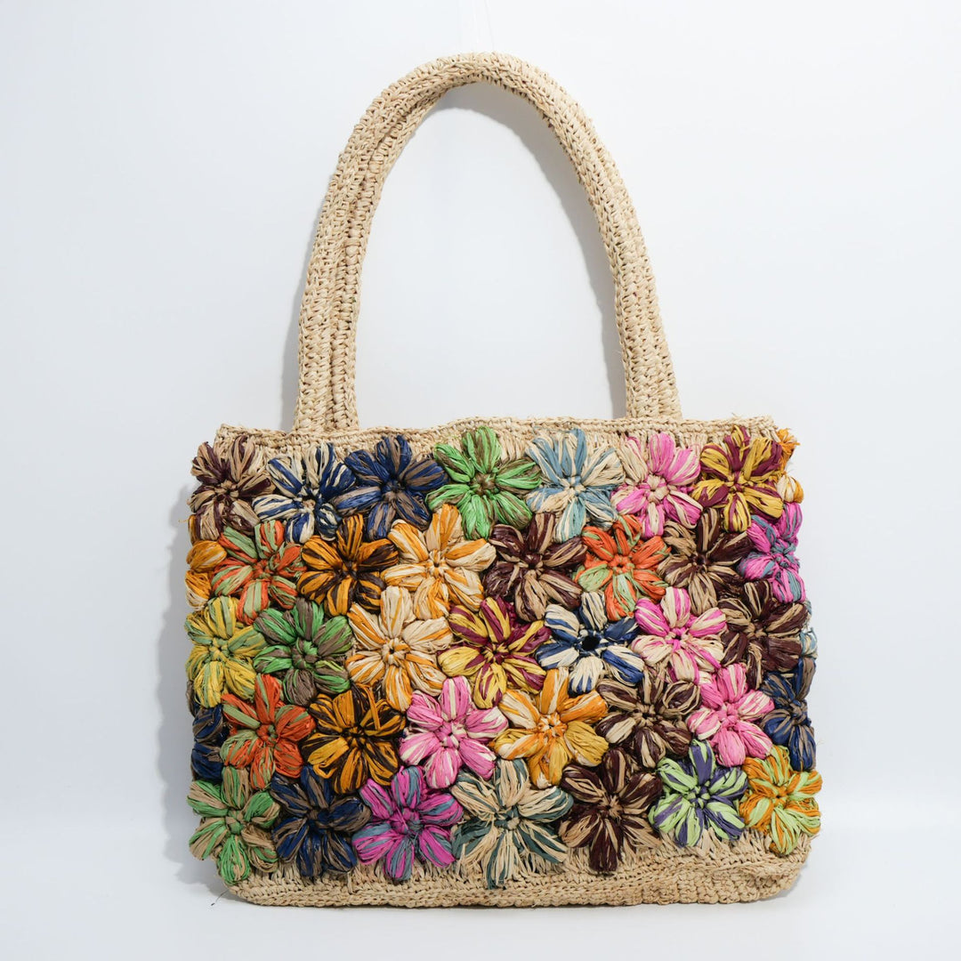 Handcrafted straw bag with floral appliqués Bowlift