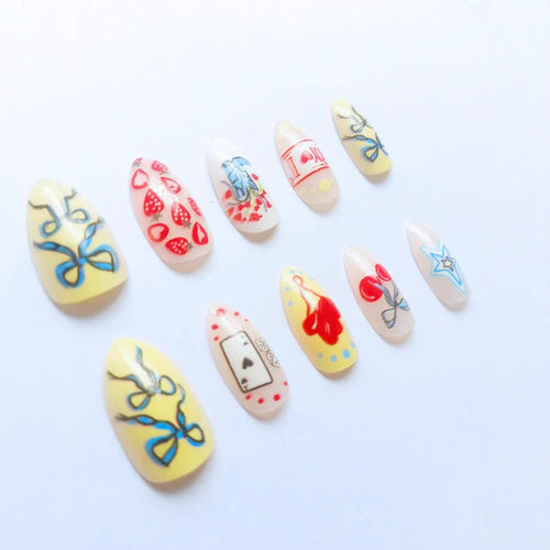Art nail set with playful motifs and creative designs Bowlift