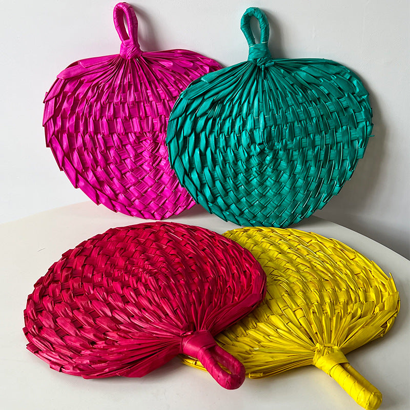 Women hand-woven fan made of natural material Bowlift