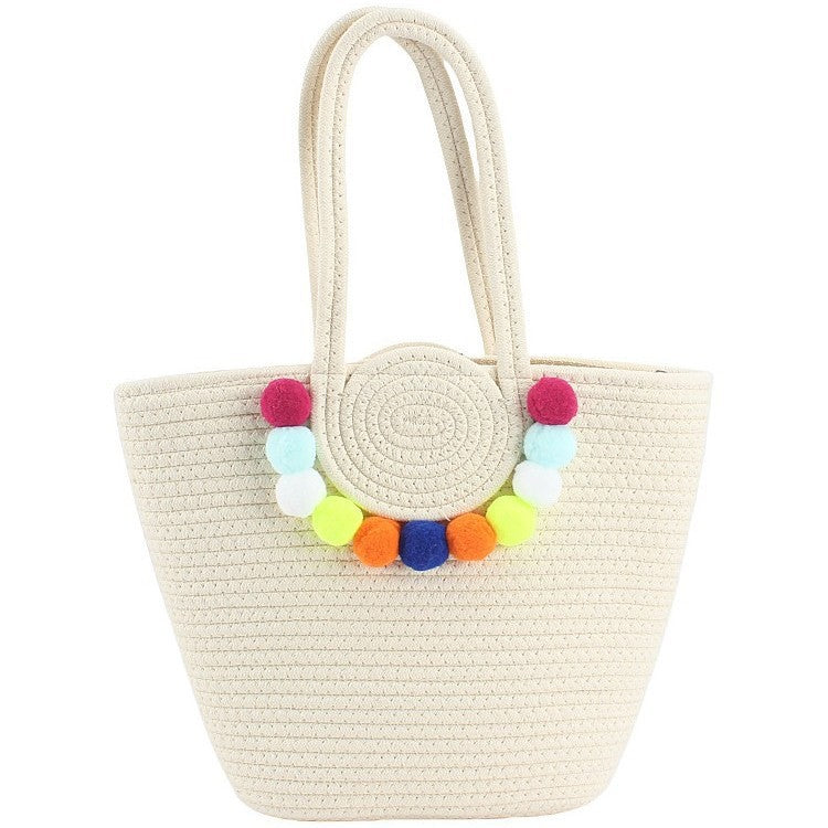 Beach bag with cheerful pom poms Bowlift