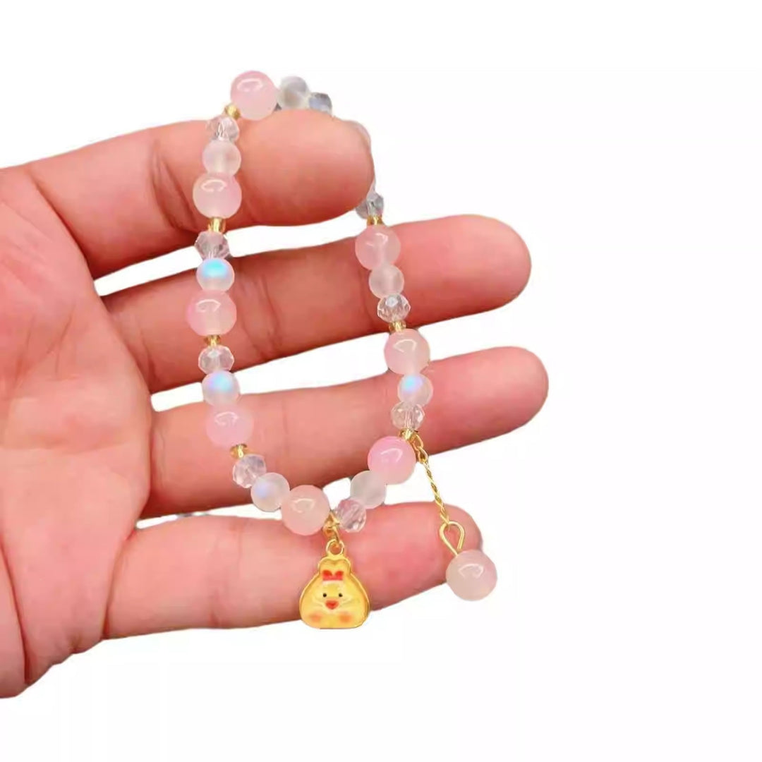 Playful bracelet with colorful glass beads and pendant Bowlift
