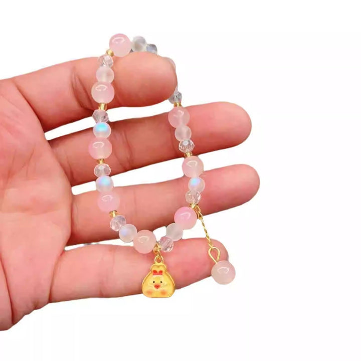 Playful bracelet with colorful glass beads and pendant Bowlift