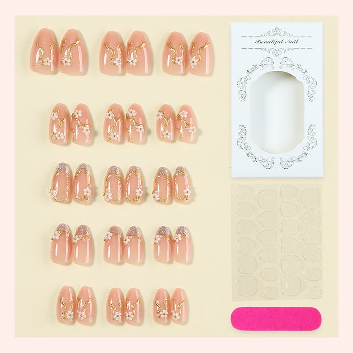 Creative nail art set with delicate flower decoration and glitter elements Bowlift