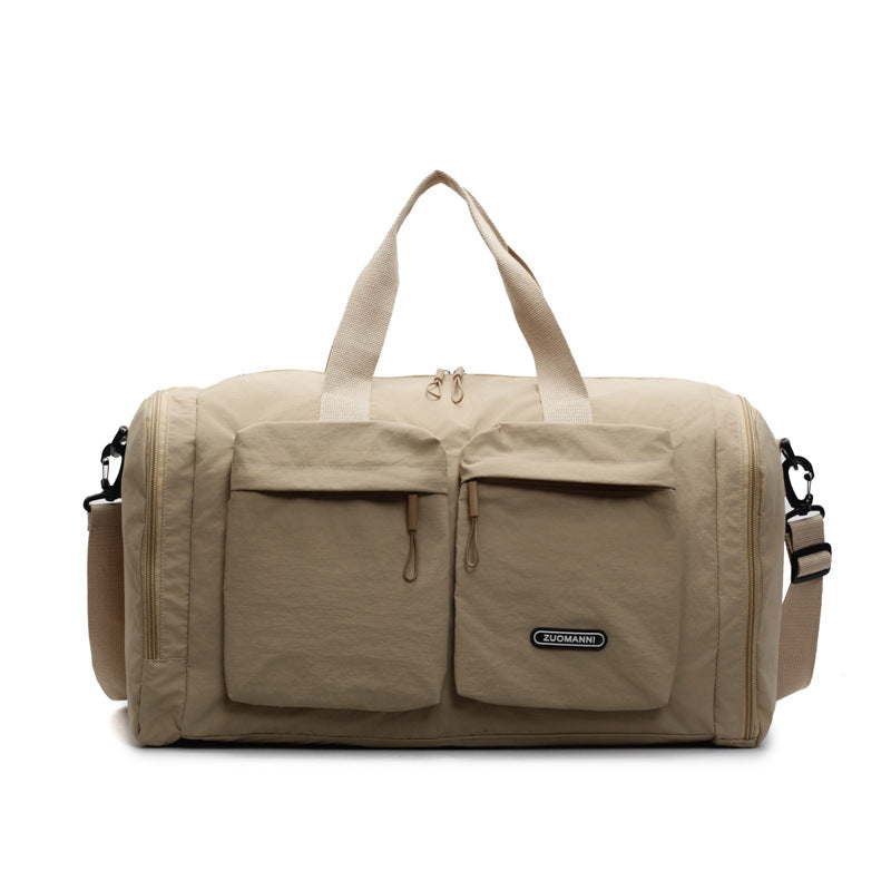 Sporty Travel Bag With Several Exterior Pockets Bowlift