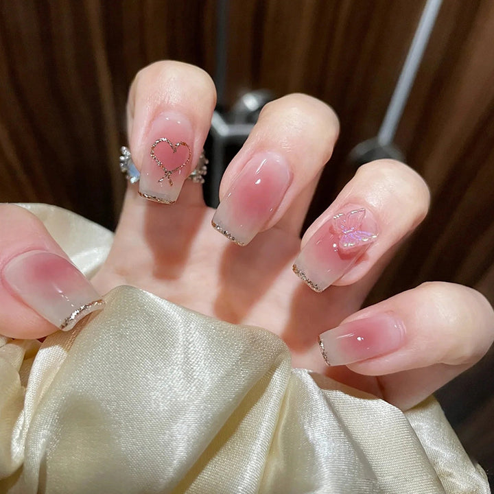 Stylish art false nails with heart design and glitter Bowlift
