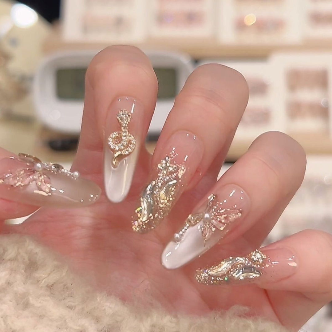 Elegant Nail Art Extensions with Pearl Accents Bowlift