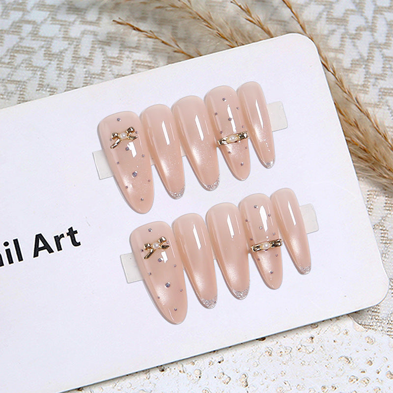 Acrylic nail set with elegant jewelry details Bowlift