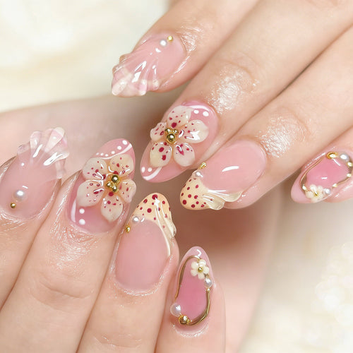 Nail set with floral design and elegant accents Bowlift
