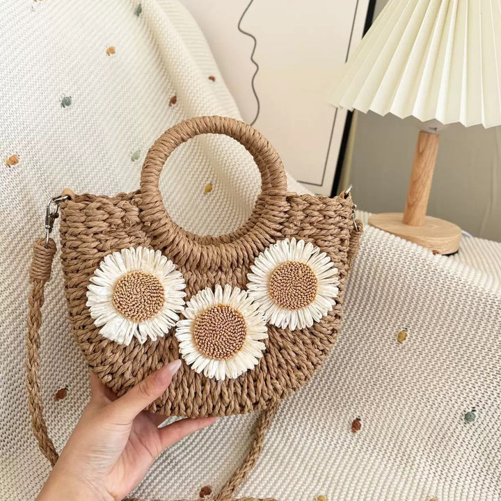 Handbag made of natural material with floral accents Bowlift