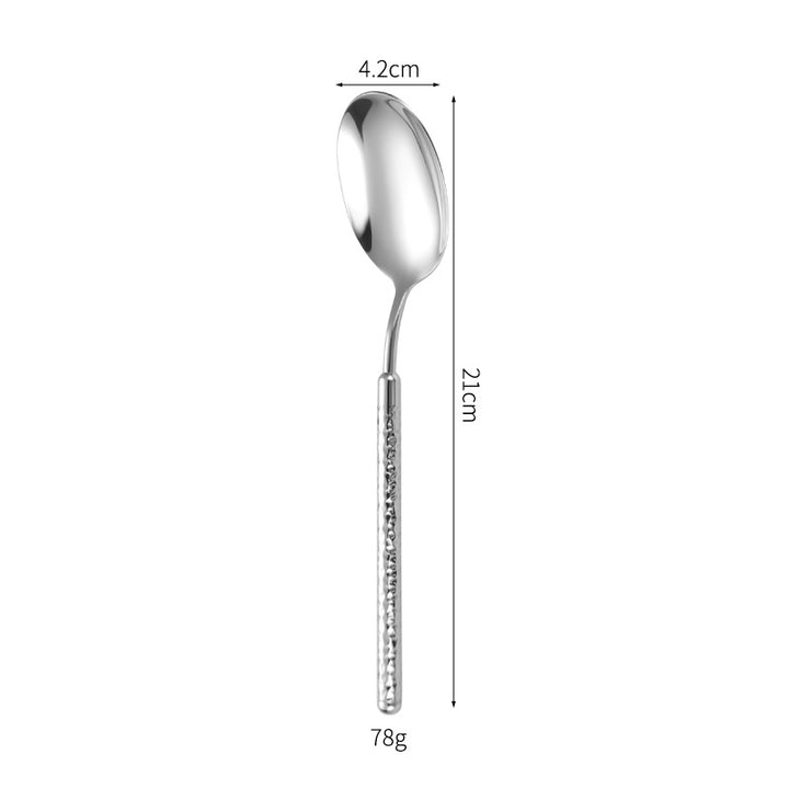Elegant dessert spoon with elaborate handle design Bowlift