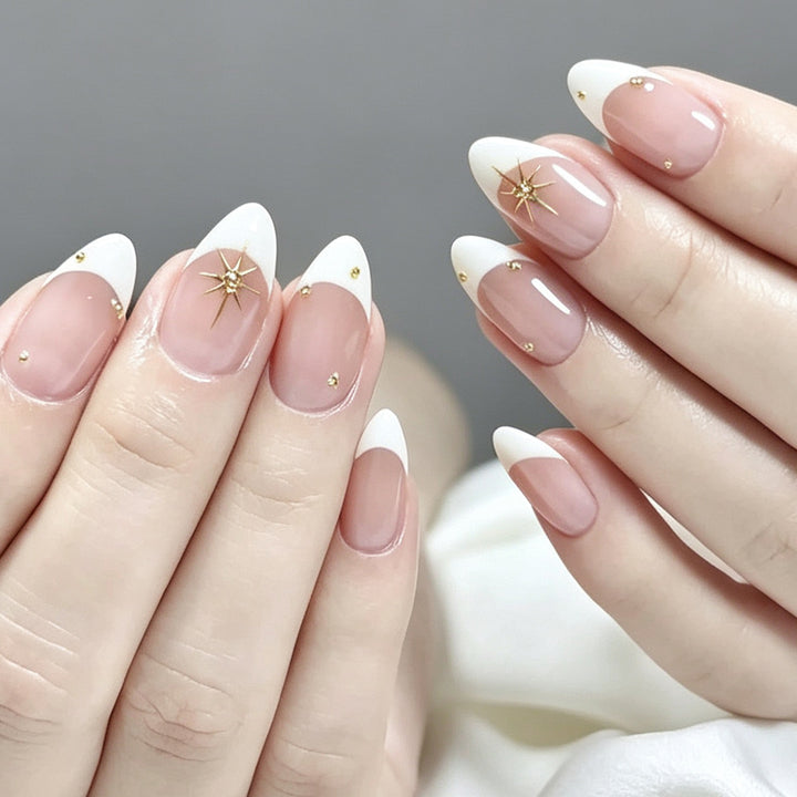 Elegant French Tip Nail Art with Gold Accents Bowlift